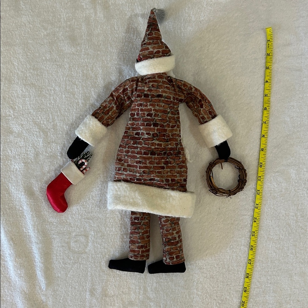 Festive Santa Claus Plush with Wreath and Stocking - Picture 8 of 9